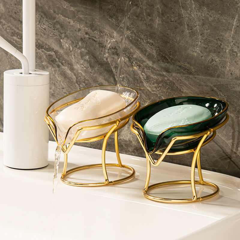 Close-up of drain soap holder in light luxury finish