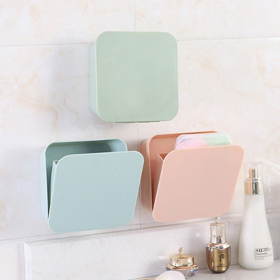 Wall-mounted decorative shelf with makeup and beauty products neatly organized.