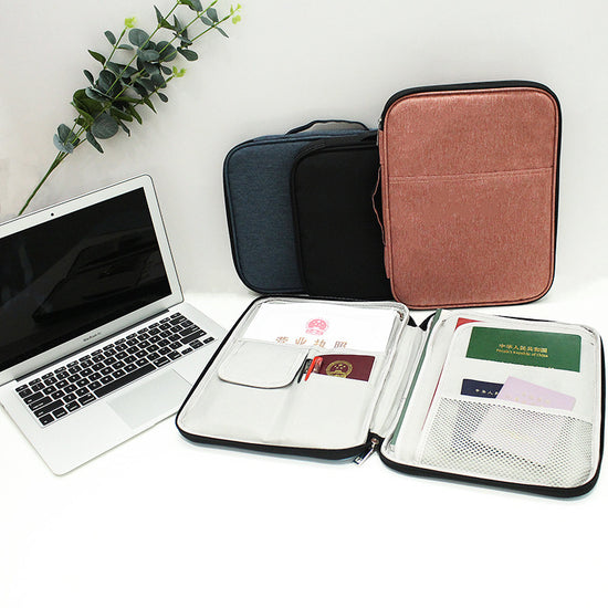 Foldable organizer bag with multiple zippered layers for travel essentials